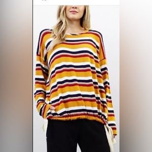 Funnel hem, long sleeve multi stripe knit top.